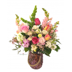 Beaverton Florists Beaverton - Surprise your loved one with a charming selection of cream, blush and pink flowers.

Roses, stock, spray roses, tulips, and way more in a contemporary pink glass vase. 