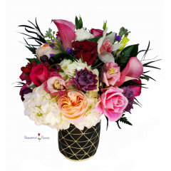 Beaverton Florists Beaverton - The most atractive of our "CLOUDs". Rich pink, white, red and purple for our most popular Black Label arrangement.
Ceramic decorative vase featuring hydrangea, roses, carnations and more.
*** Ceramic vase, one of a kind, 4 different patterns, same color scheme, rustic tecture.